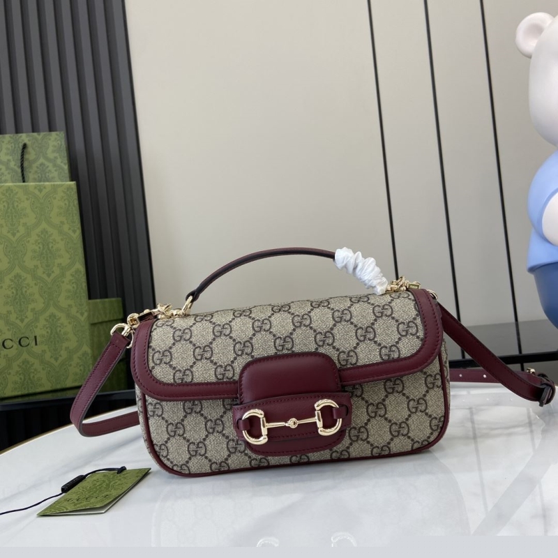 G*u*i top handle bags